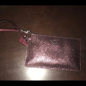 Burgundy coach wristlet